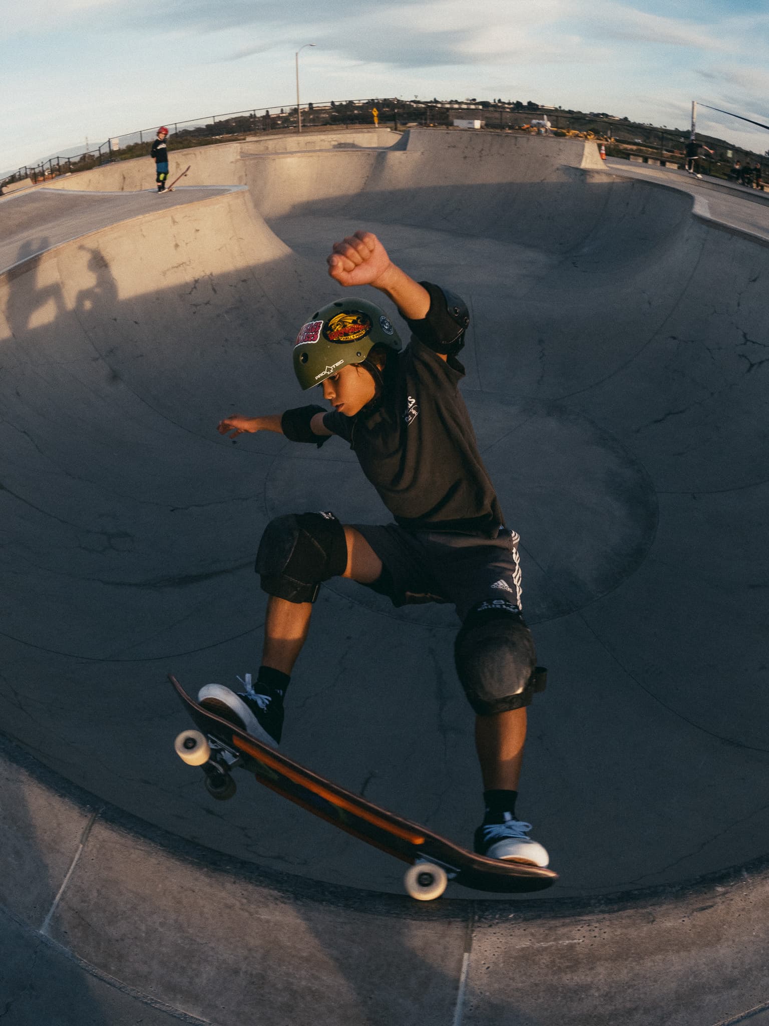 Skater dropping into a bowl
