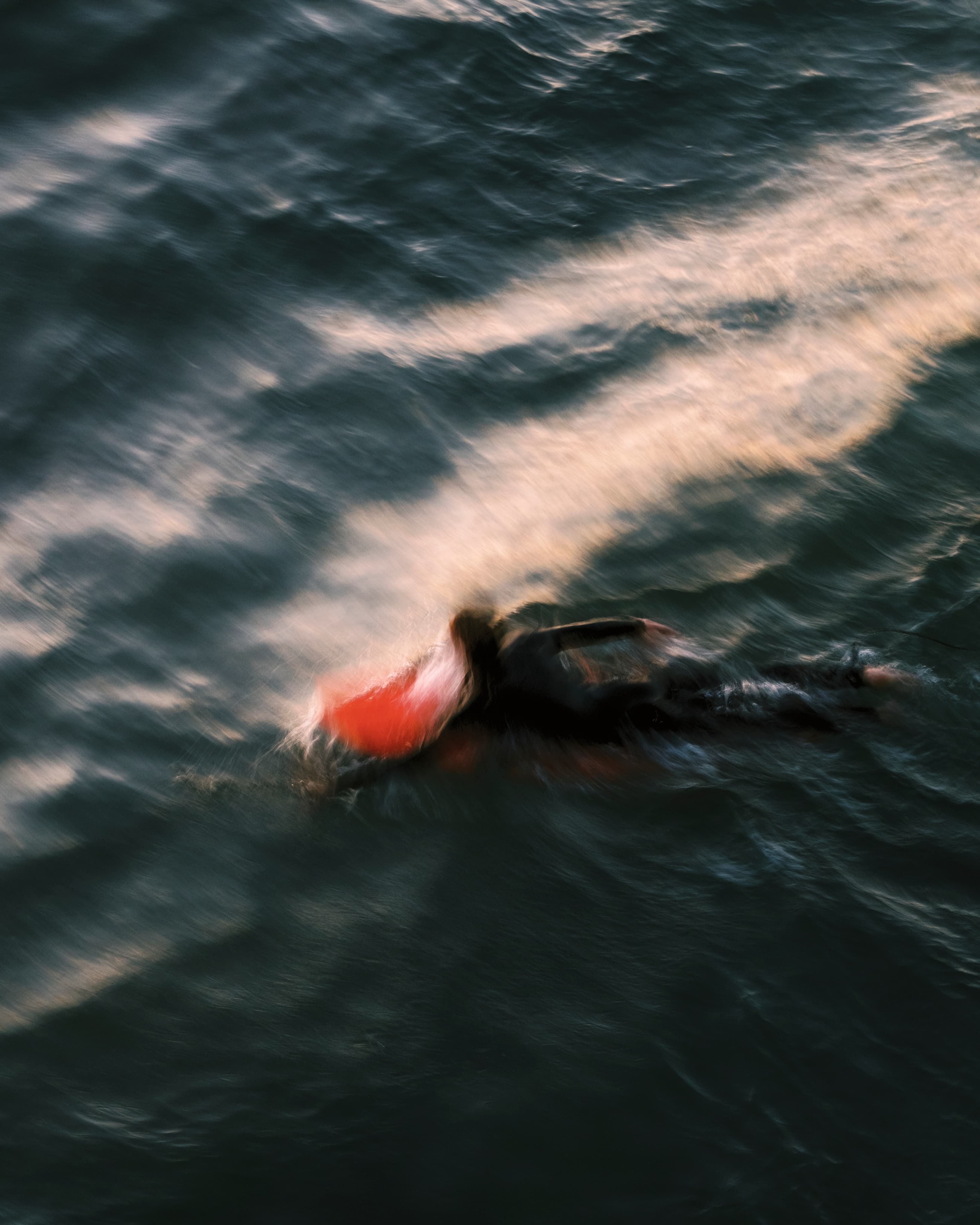 Blurred motion paddle-out shot
